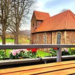Апартаменты Gaestehaus Am Weser-radweg